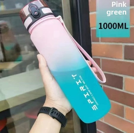 The sports water cup is made of plastic with a large capacity