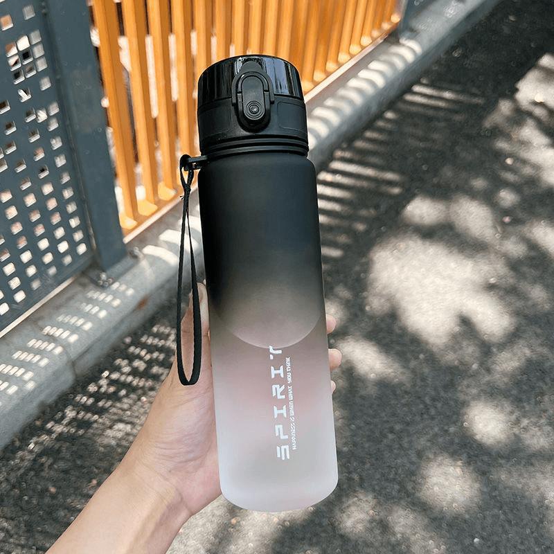 The sports water cup is made of plastic with a large capacity